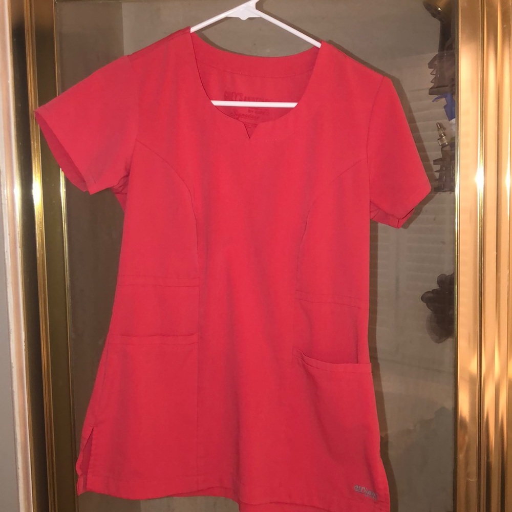 Set of four scrub tops